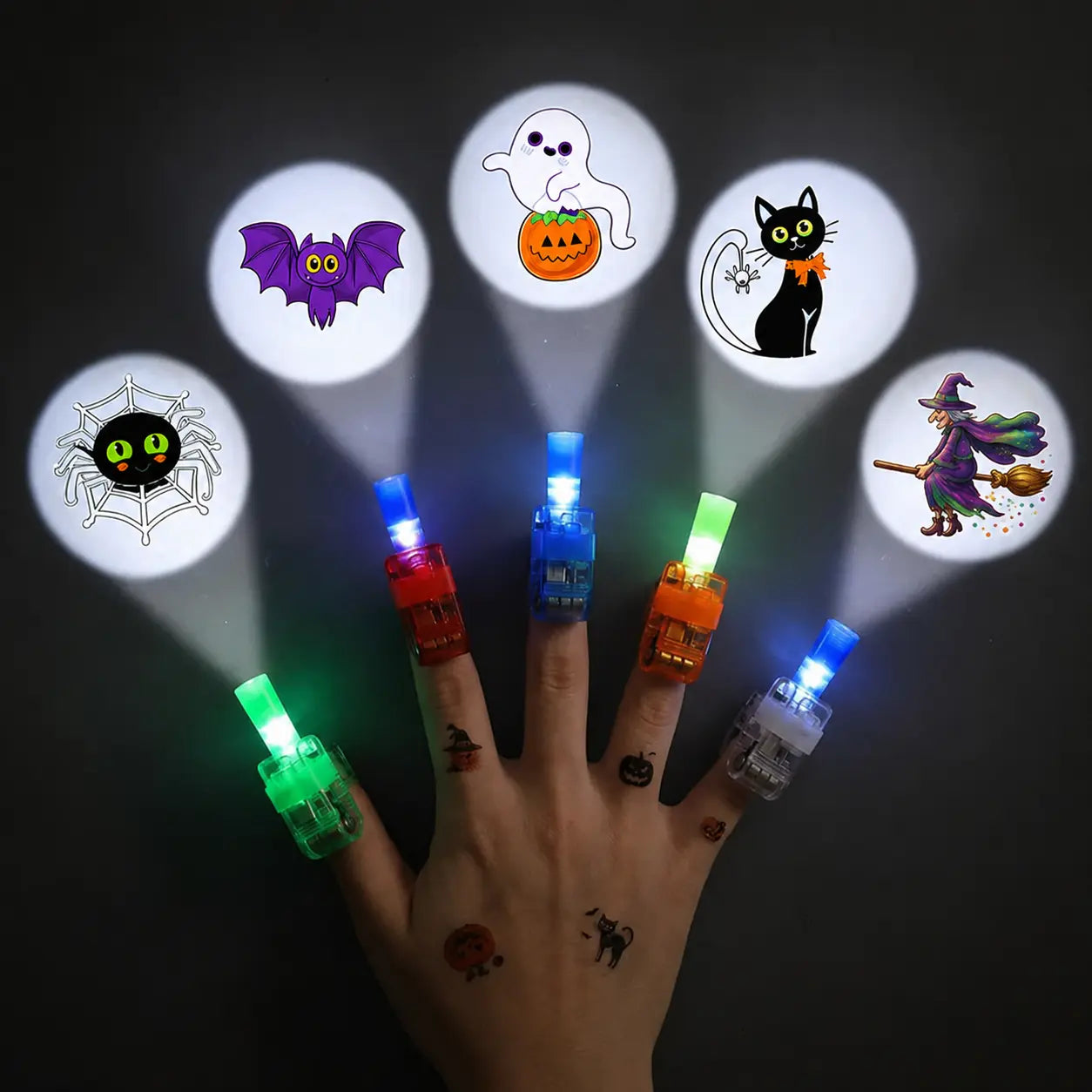 Halloween finger projector rings showing spooky projection designs