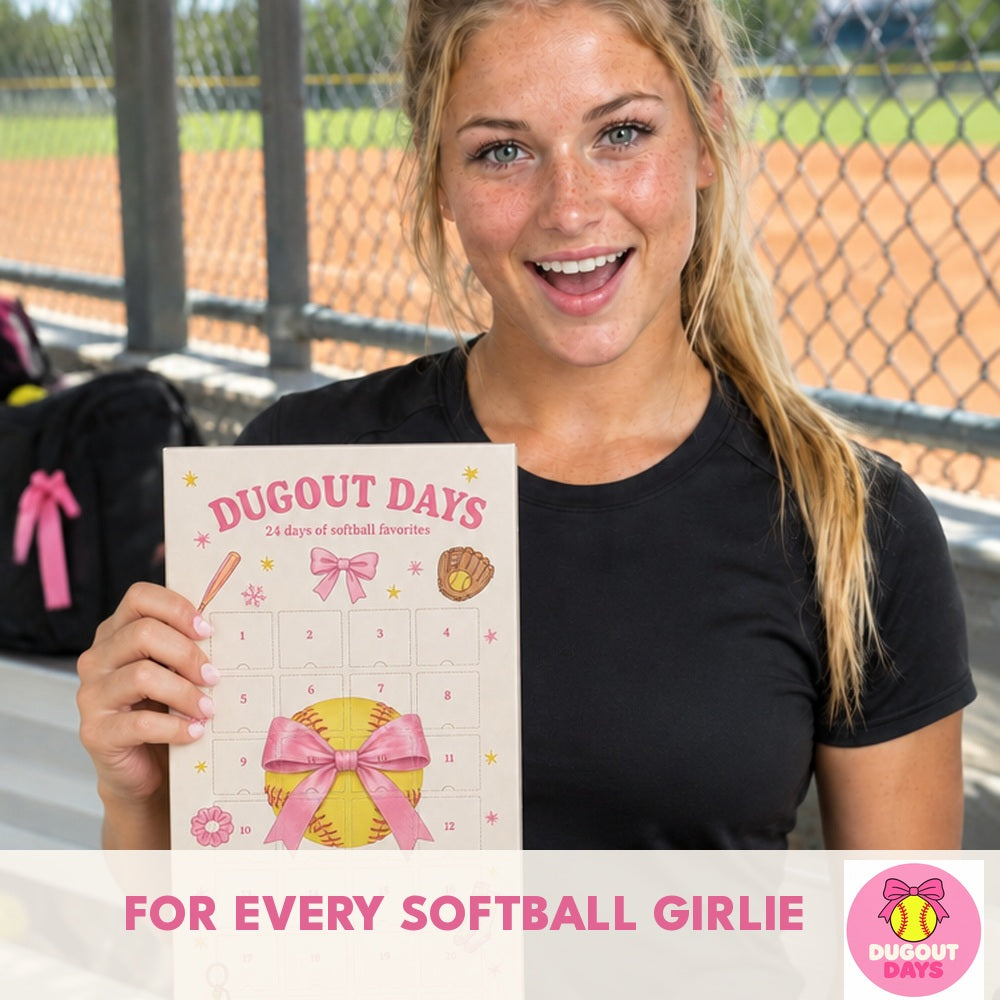 Softball player holding the Dugout Days advent calendar in the dugout